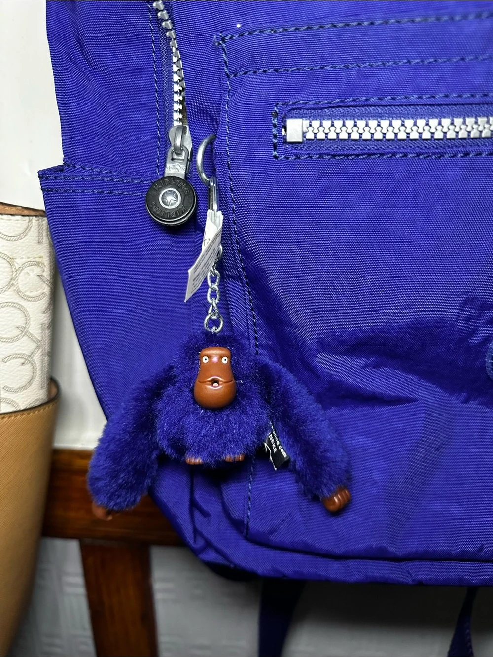 Kipling Royal Purple Nylon Backpack with Silver Zippers